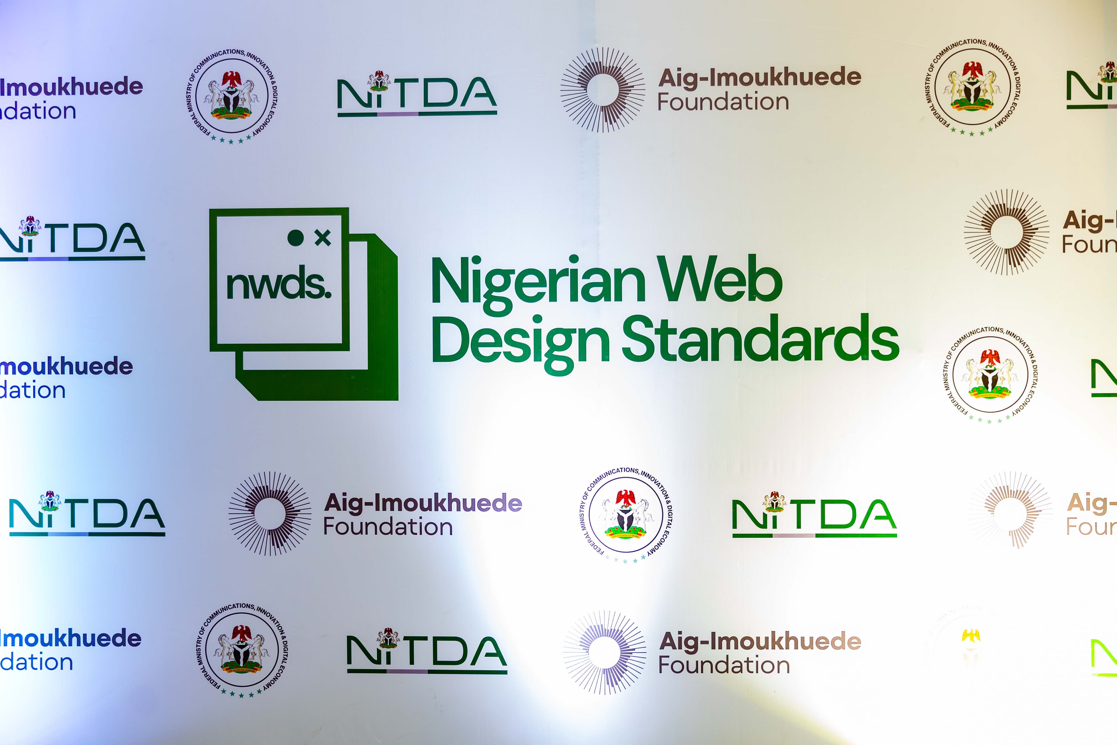 The event backdrop with the NWDS, NITDA, Aig-Imoukhuede Foundation and Federal Ministry of Communications logos